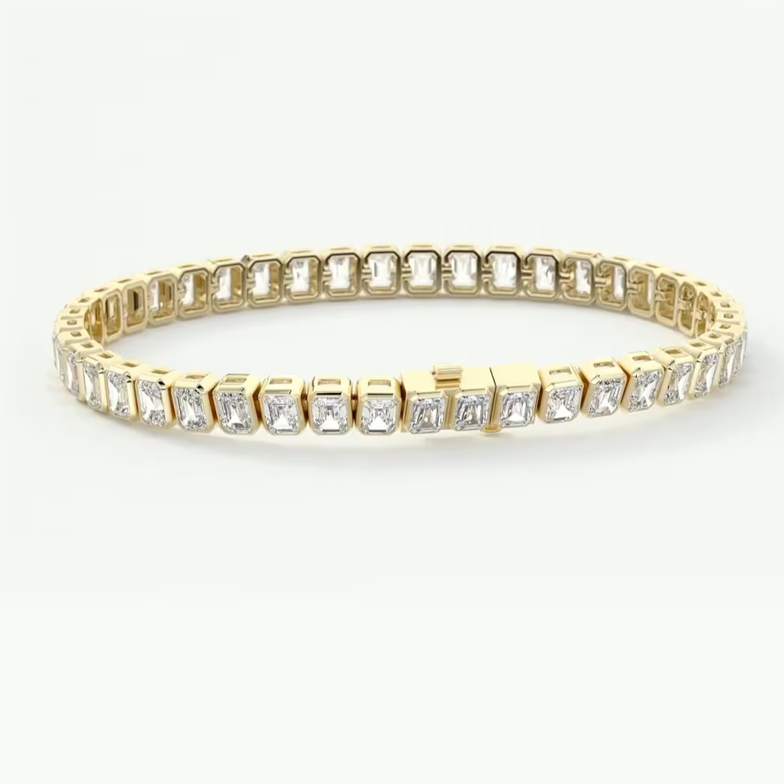 A yellow gold tennis bracelet featuring rectangular baguette-cut clear stones in a continuous row, displayed on a clean white background.