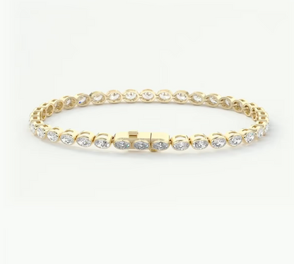 A yellow gold tennis bracelet with round-cut clear stones set in a continuous circle, displayed on a clean white background.
