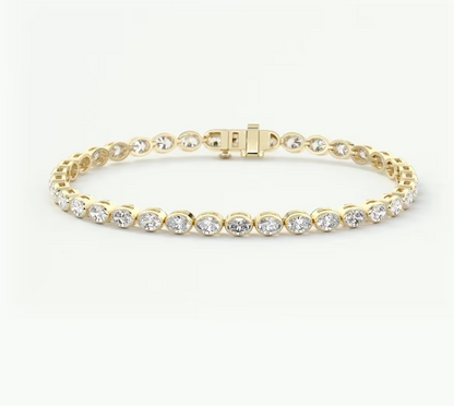 A yellow gold tennis bracelet featuring a continuous row of round-cut clear gemstones in a classic link design, displayed on a clean white background.
