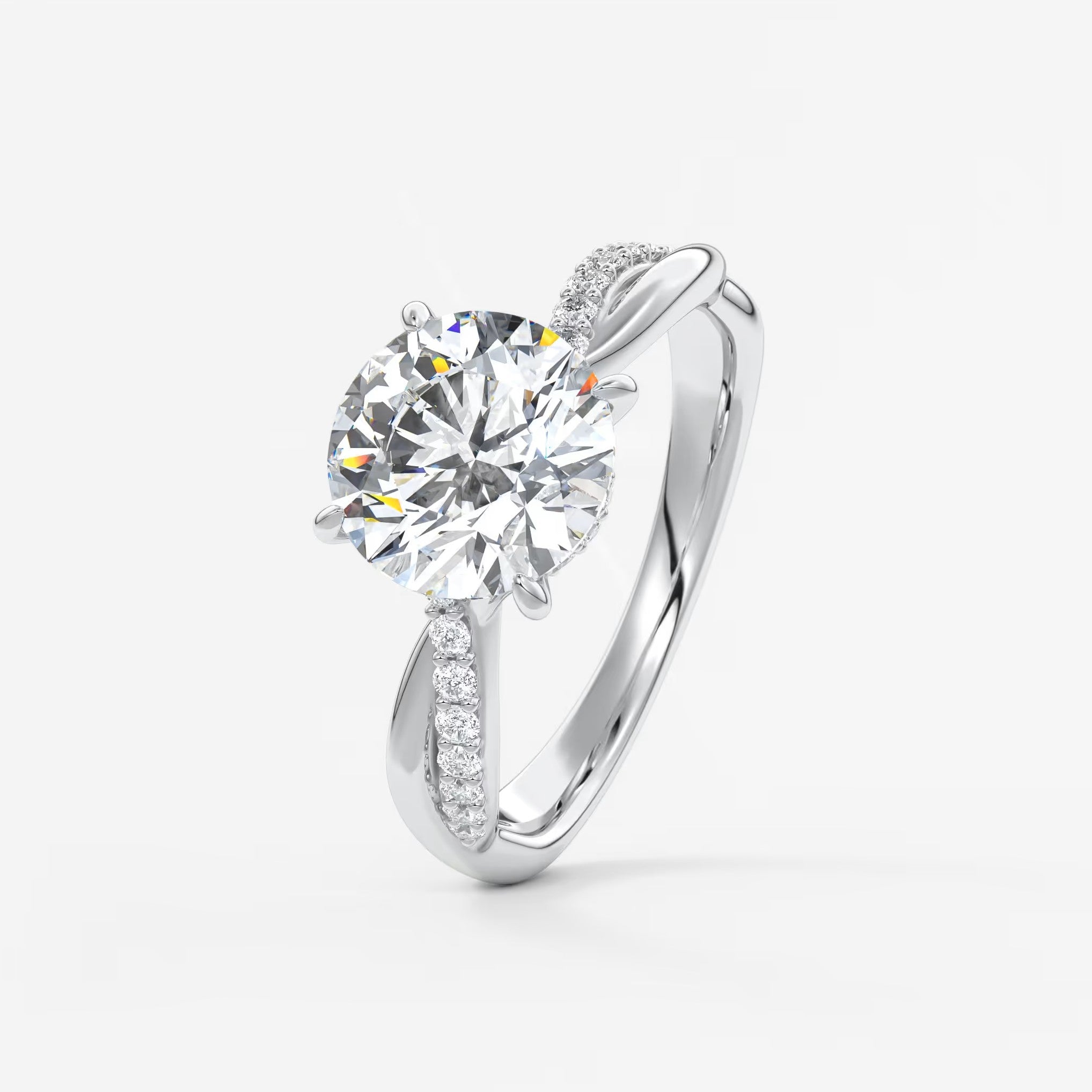 Mirella round twisted pavé engagement ring