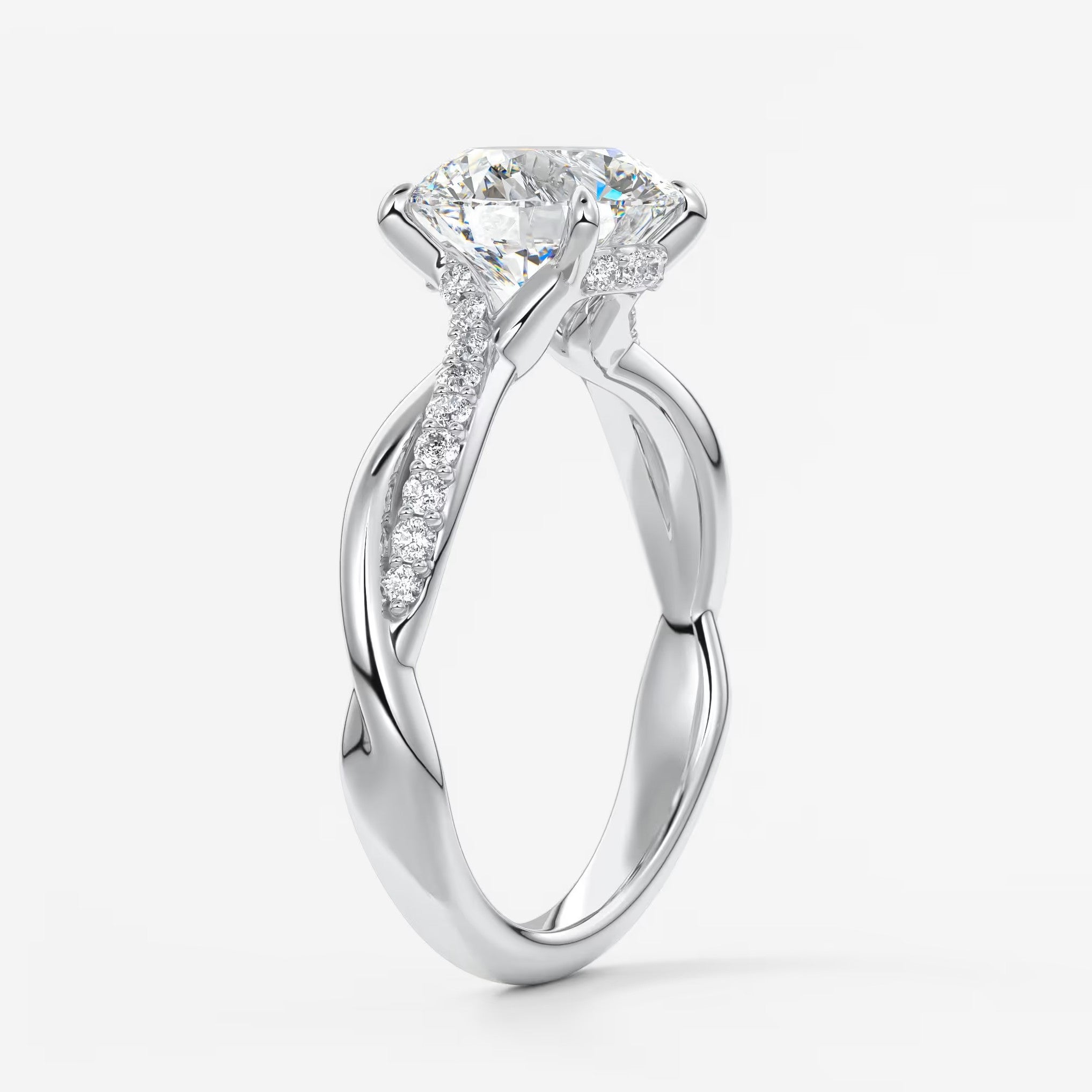 Mirella round twisted pavé engagement ring