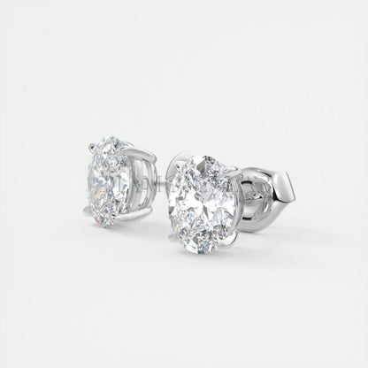 18k white gold oval diamond stud earrings.