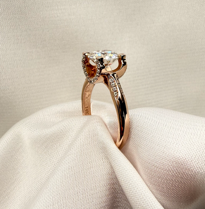 Rose gold ring with a large moissanite diamond centre stone