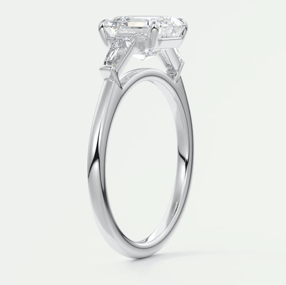 18-karat white gold engagement ring with a princess-cut diamond.
