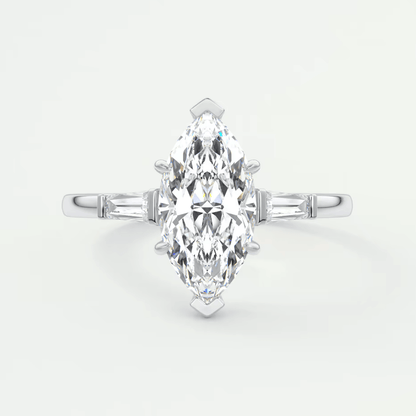 18k white gold marquise diamond engagement ring with baguette accents.