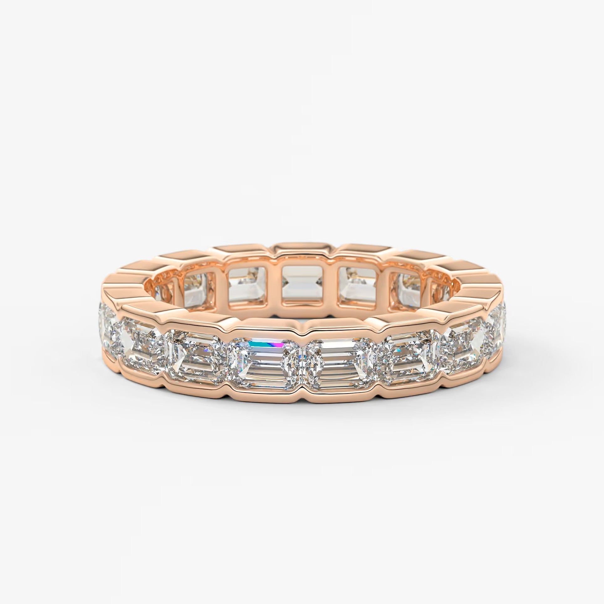 Solara east-west emerald half-bezel eternity band