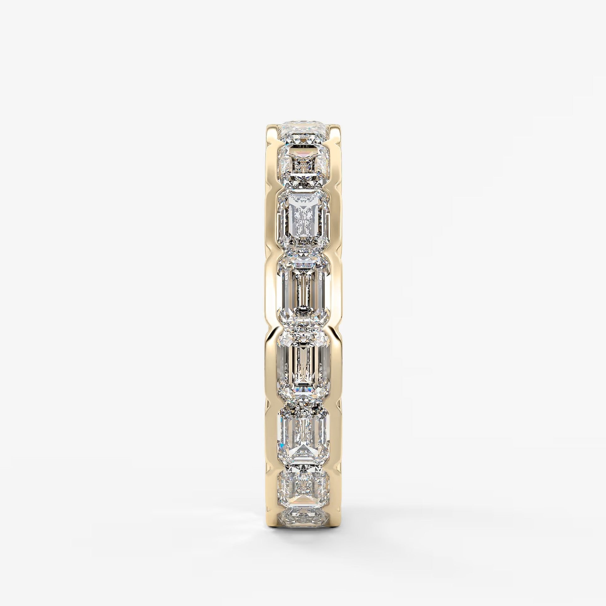 Solara east-west emerald half-bezel eternity band