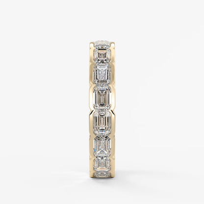 Solara east-west emerald half-bezel eternity band