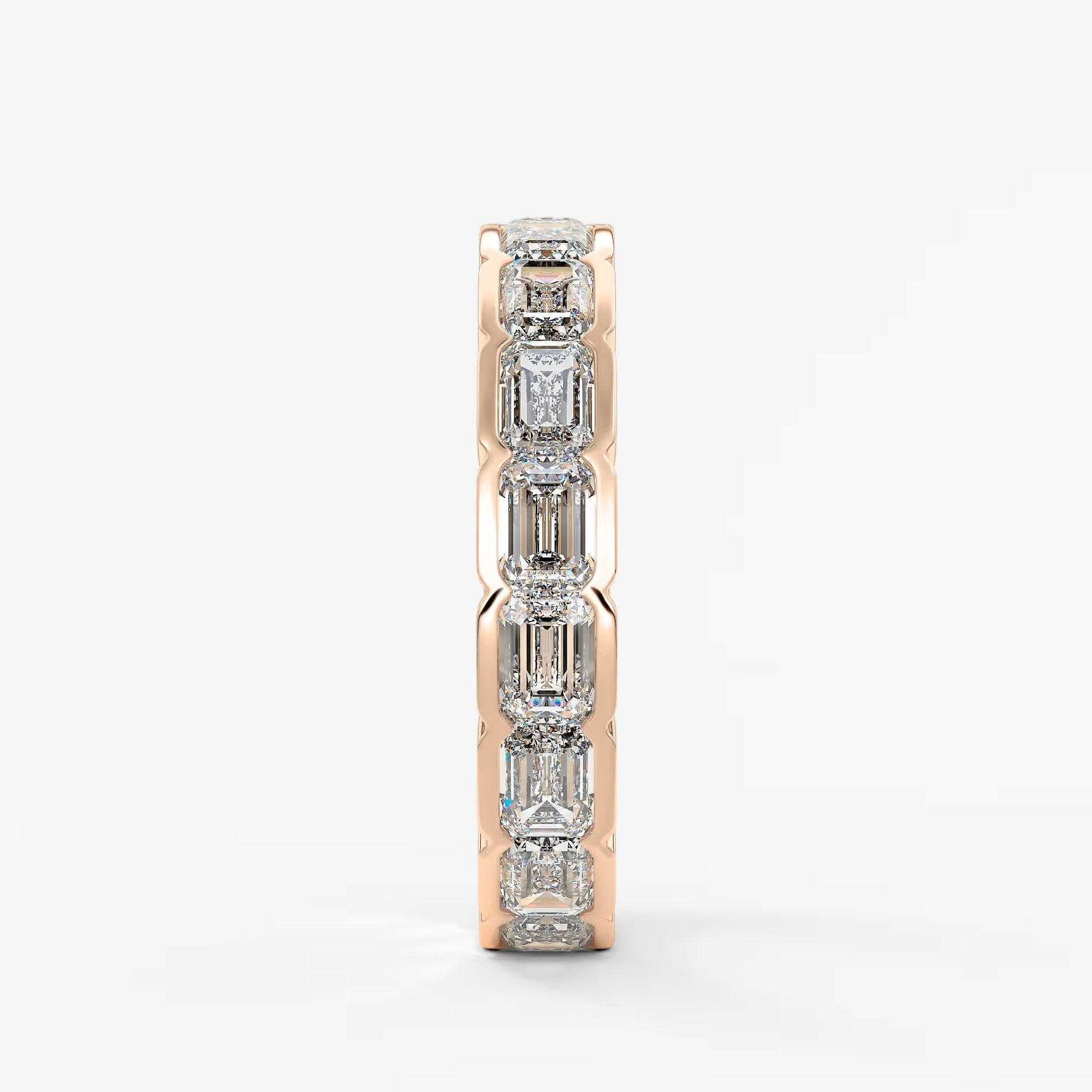 Solara east-west emerald half-bezel eternity band