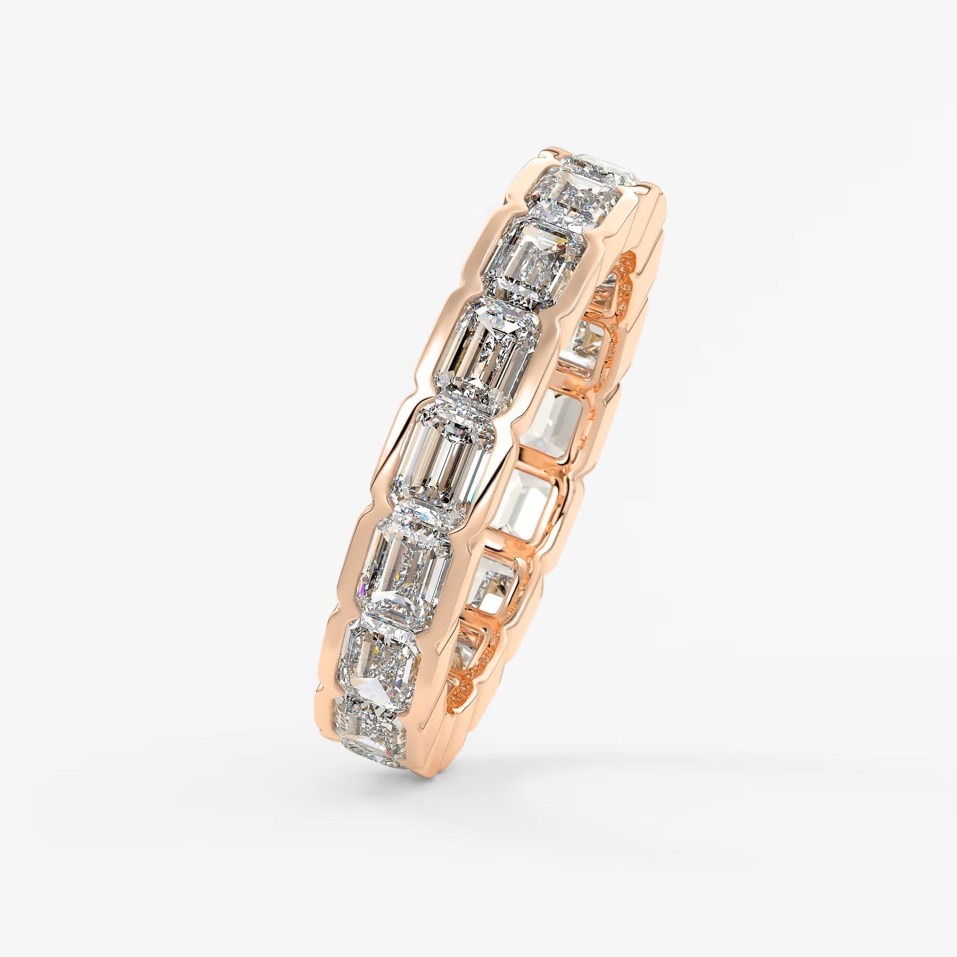 Solara east-west emerald half-bezel eternity band