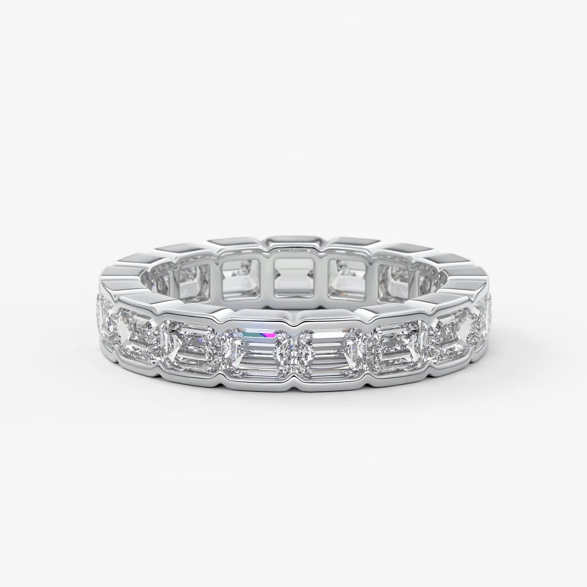 Solara east-west emerald half-bezel eternity band