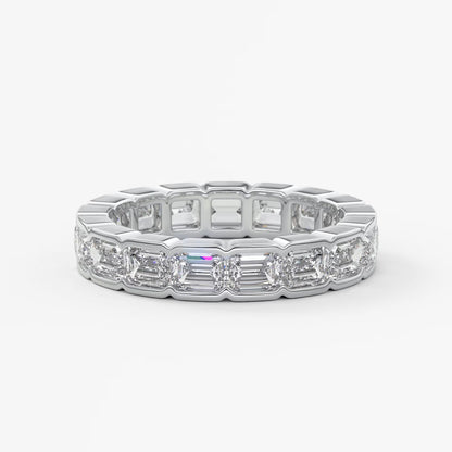Solara east-west emerald half-bezel eternity band