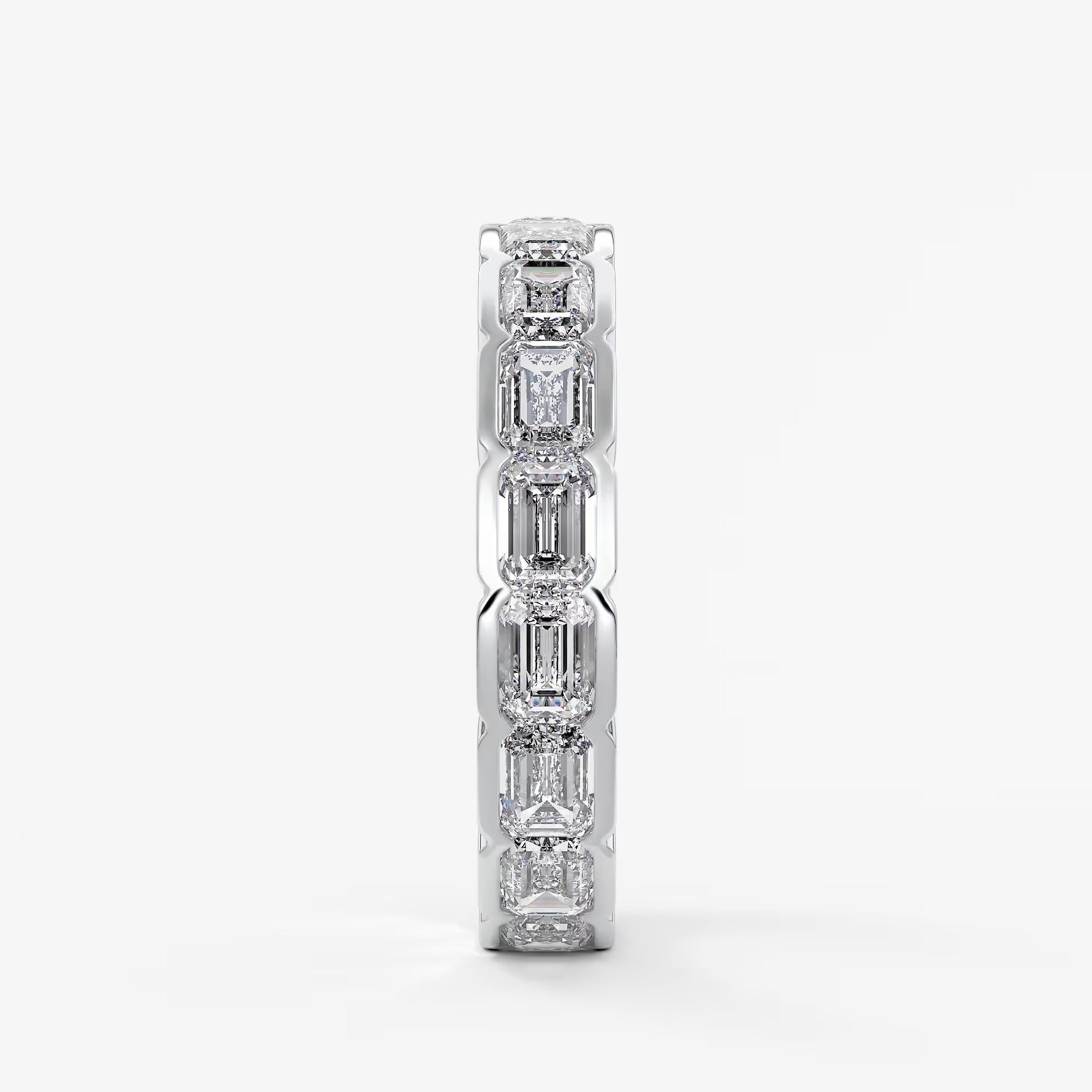 Solara east-west emerald half-bezel eternity band