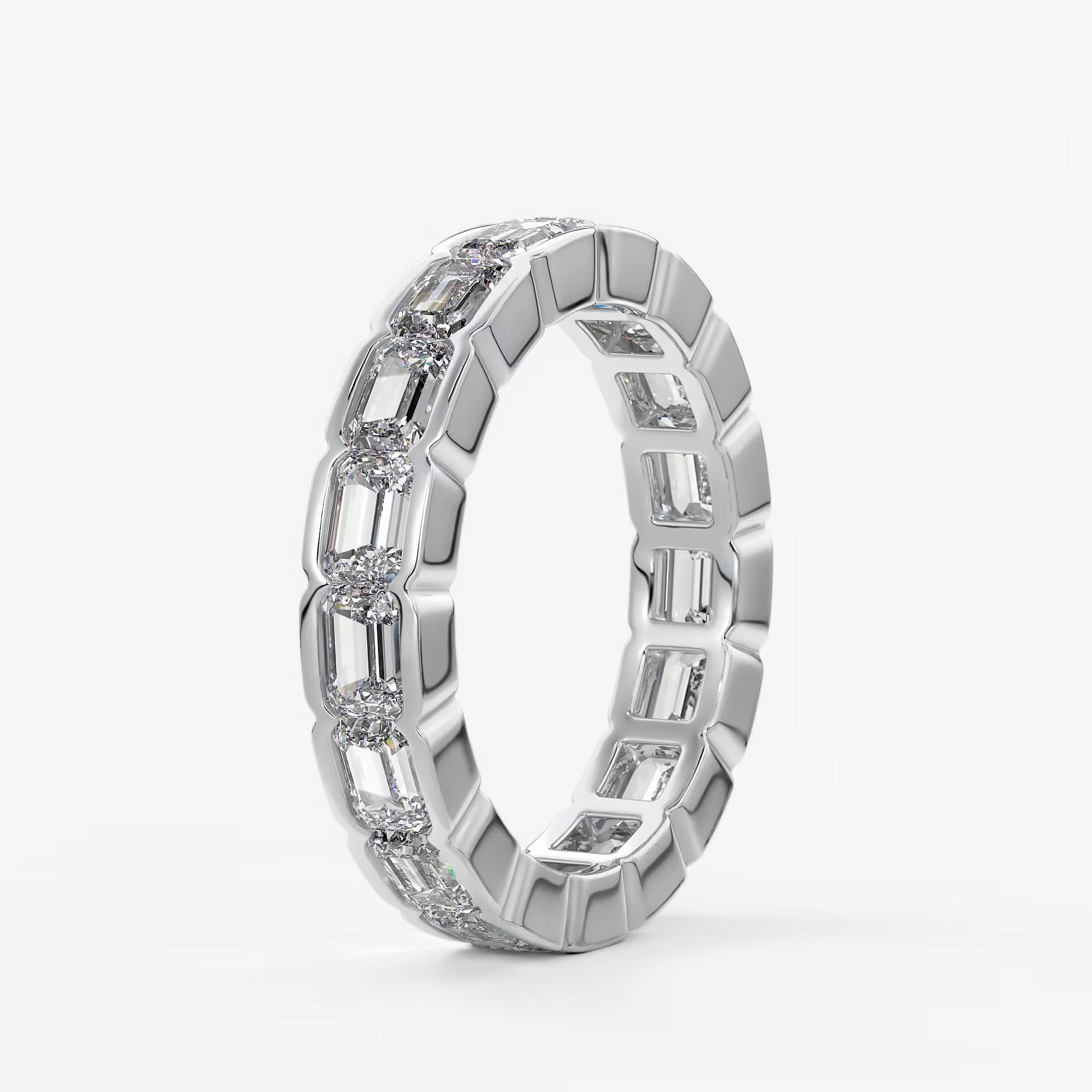 Solara east-west emerald half-bezel eternity band