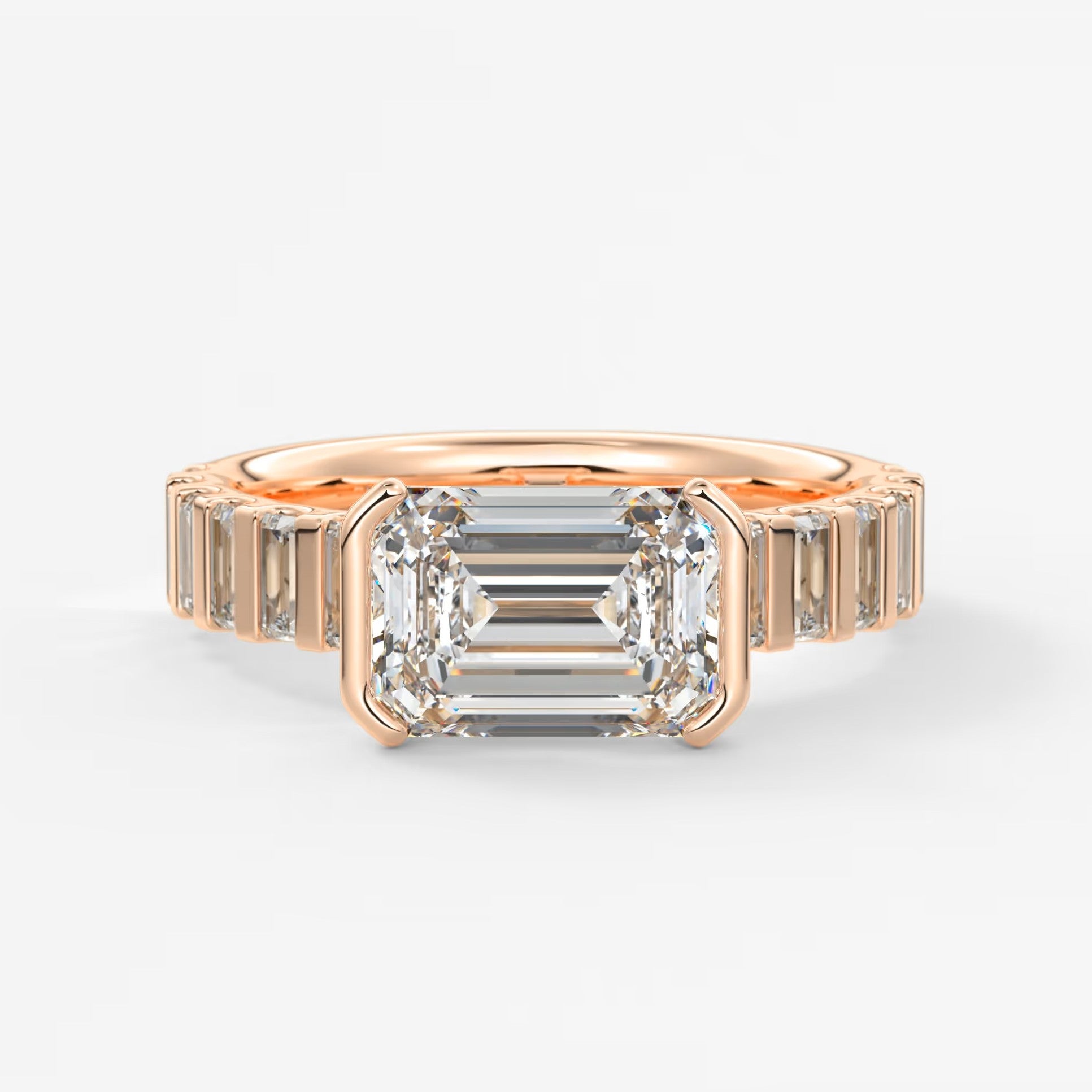 Solara grande east-west emerald half-bezel engagement ring