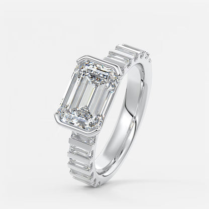 Solara grande east-west emerald half-bezel engagement ring