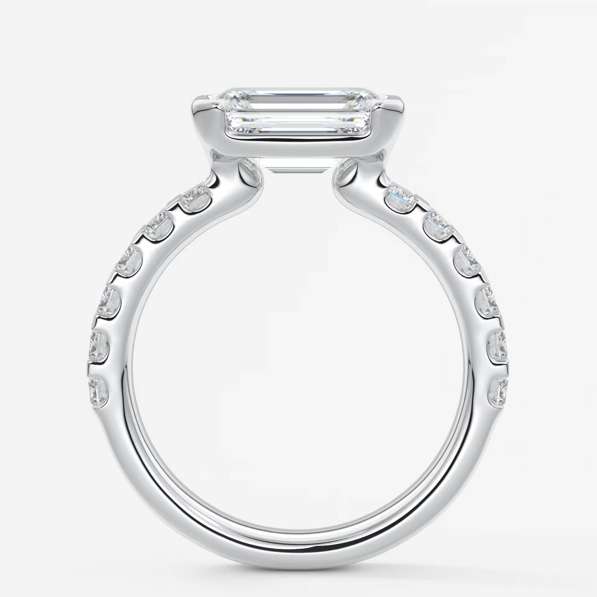 Solara grande east-west emerald half-bezel engagement ring