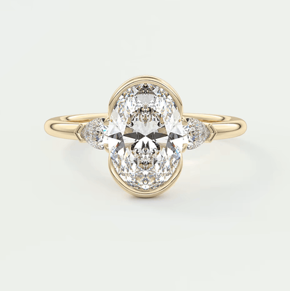 18k yellow gold engagement ring with an oval diamond center and small diamonds on the band.