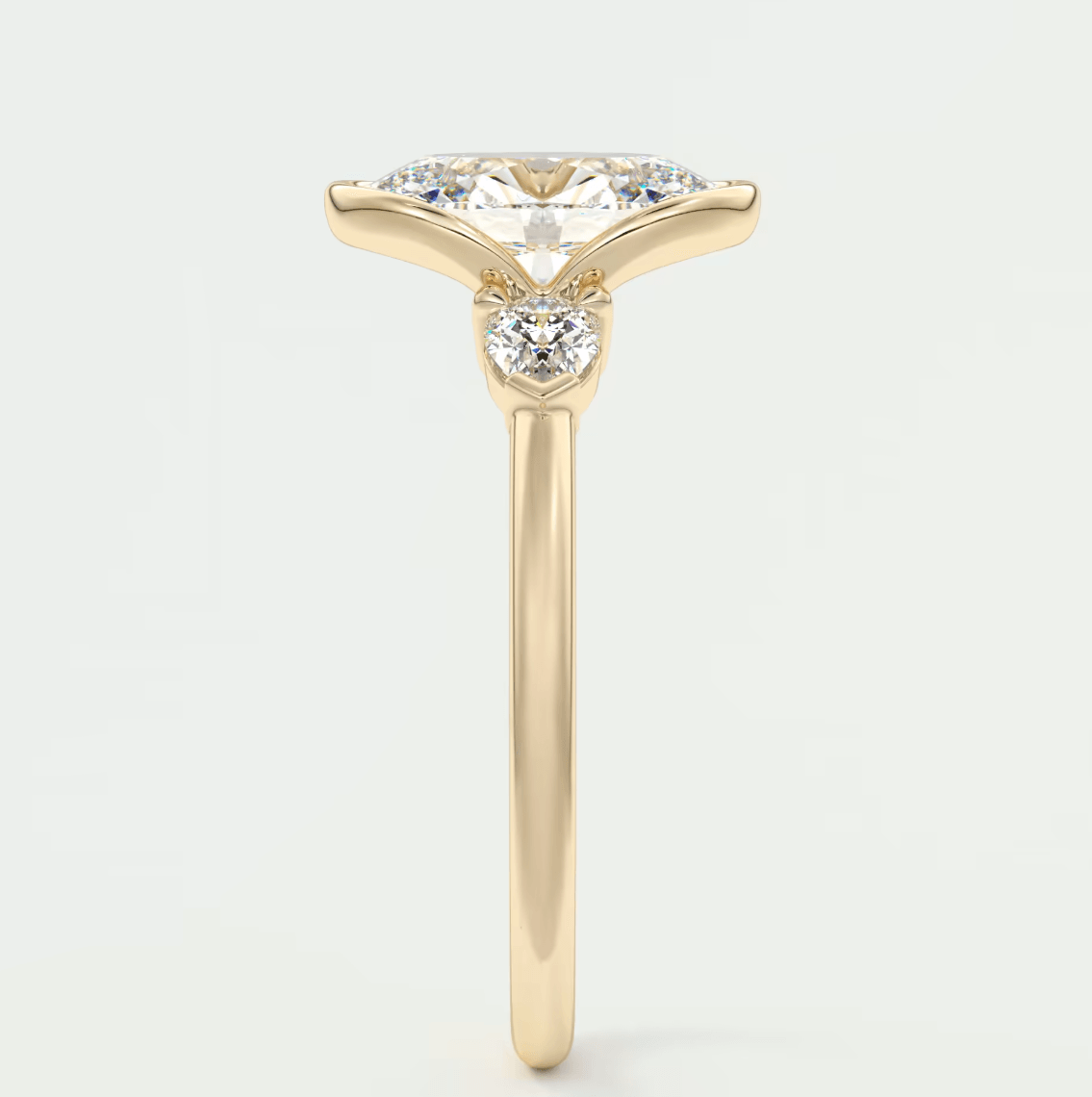 18k yellow gold engagement ring with princess cut diamond and small accent diamonds.