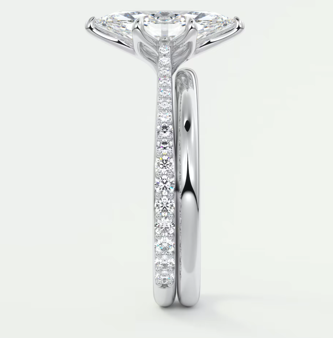 Custom made solenne marquise pavé cathedral solitaire engagement ring | diamondlab