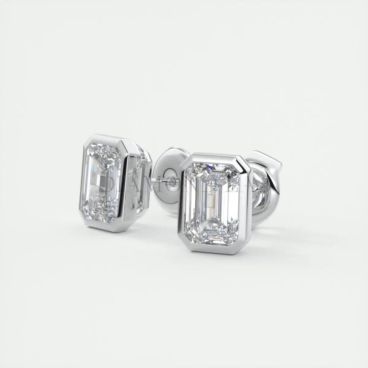 18k white gold diamond stud earrings with emerald-cut diamonds.