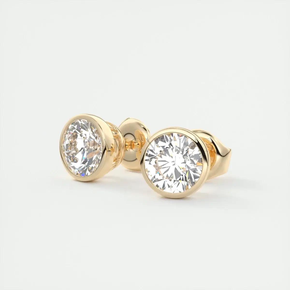 14k gold diamond stud earrings with bezel setting.