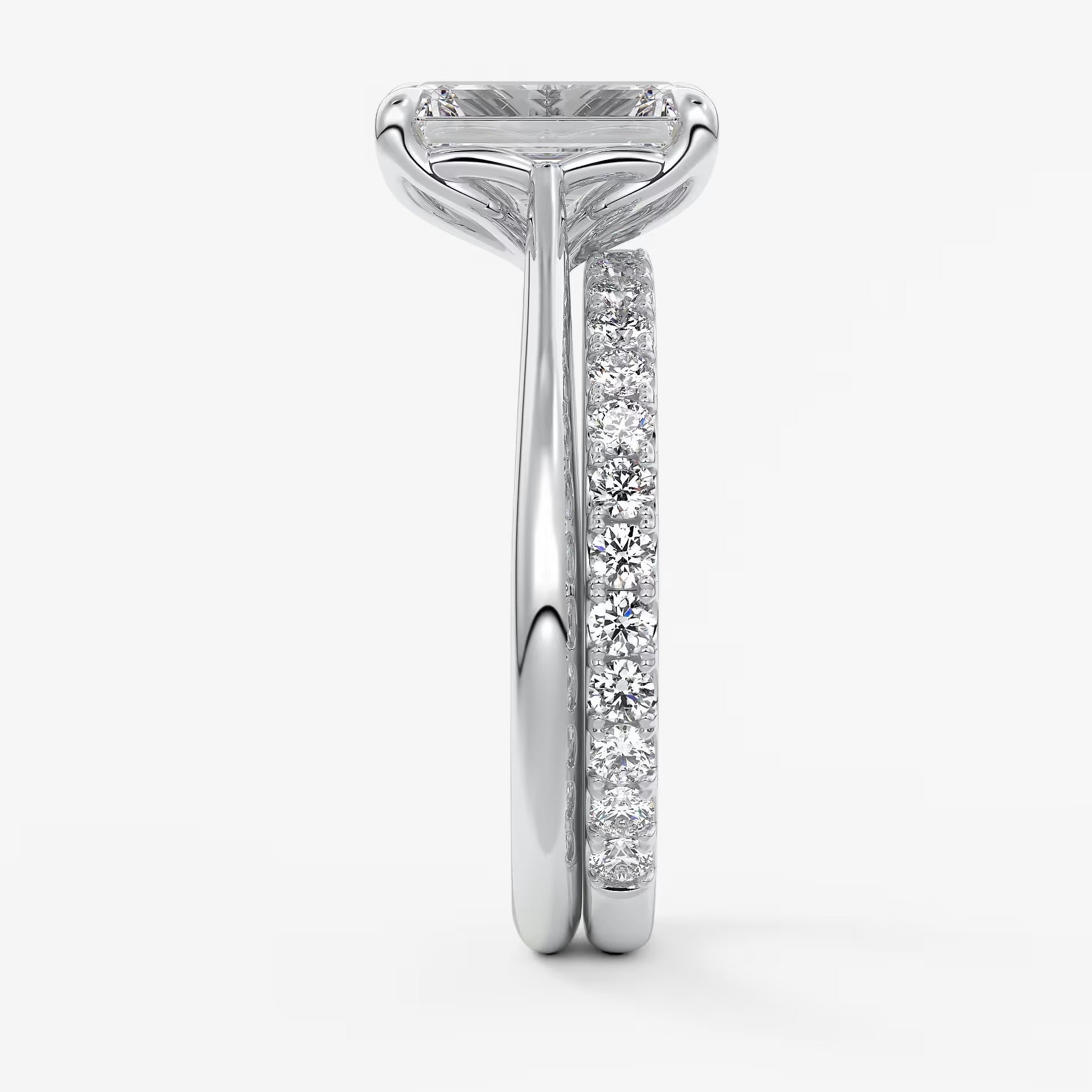 Tulip emerald cathedral engagement ring