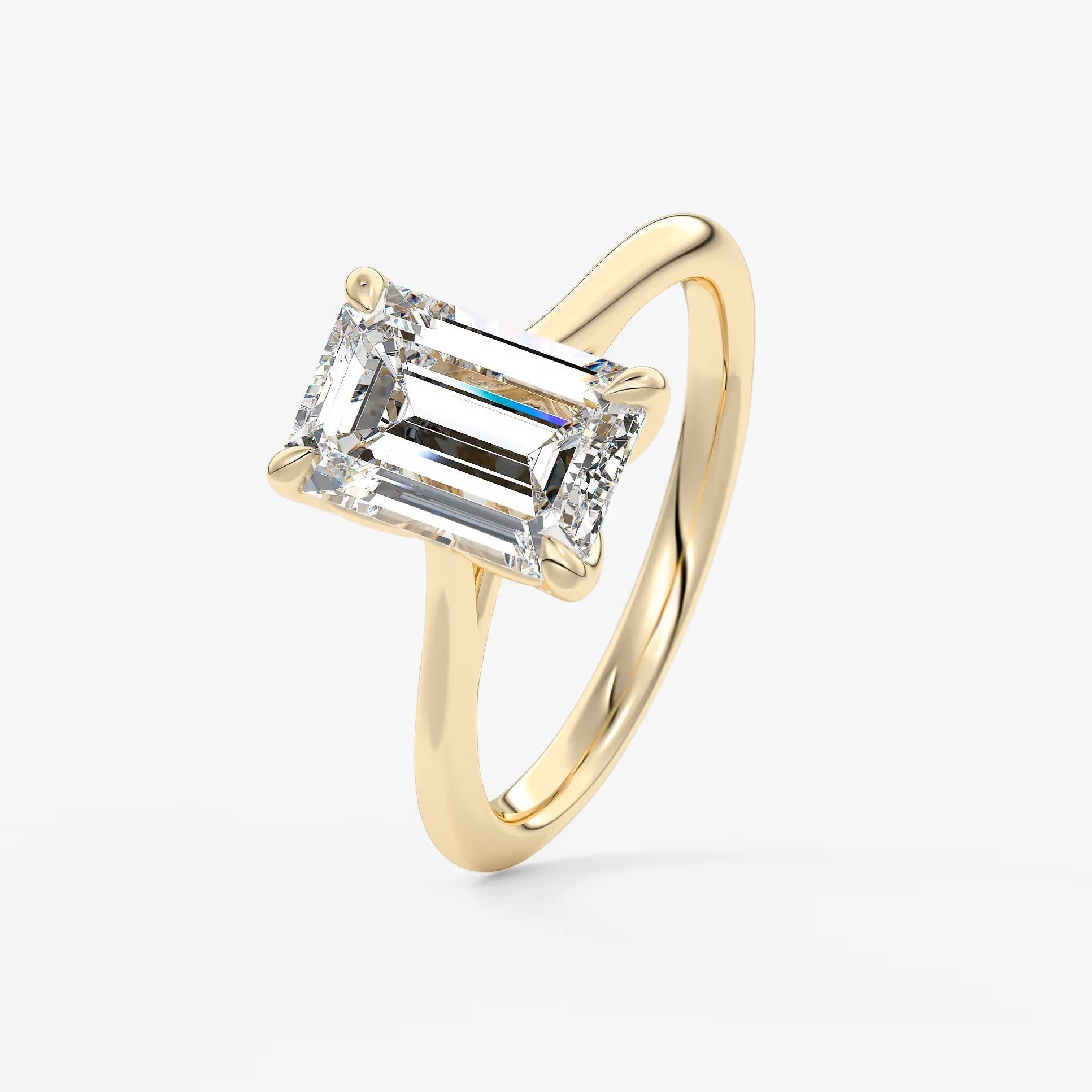Tulip emerald cathedral engagement ring