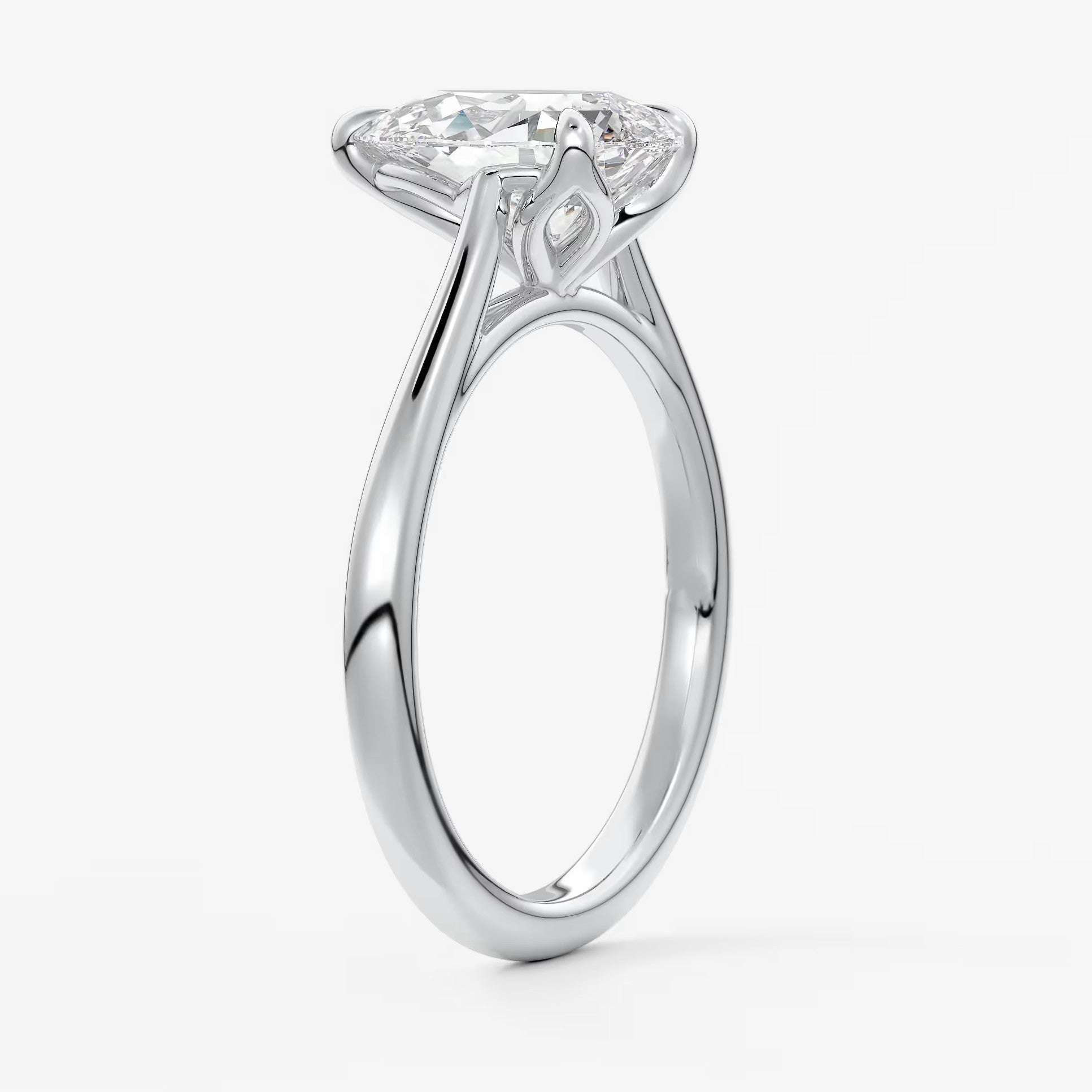 Tulip pear cathedral engagement ring