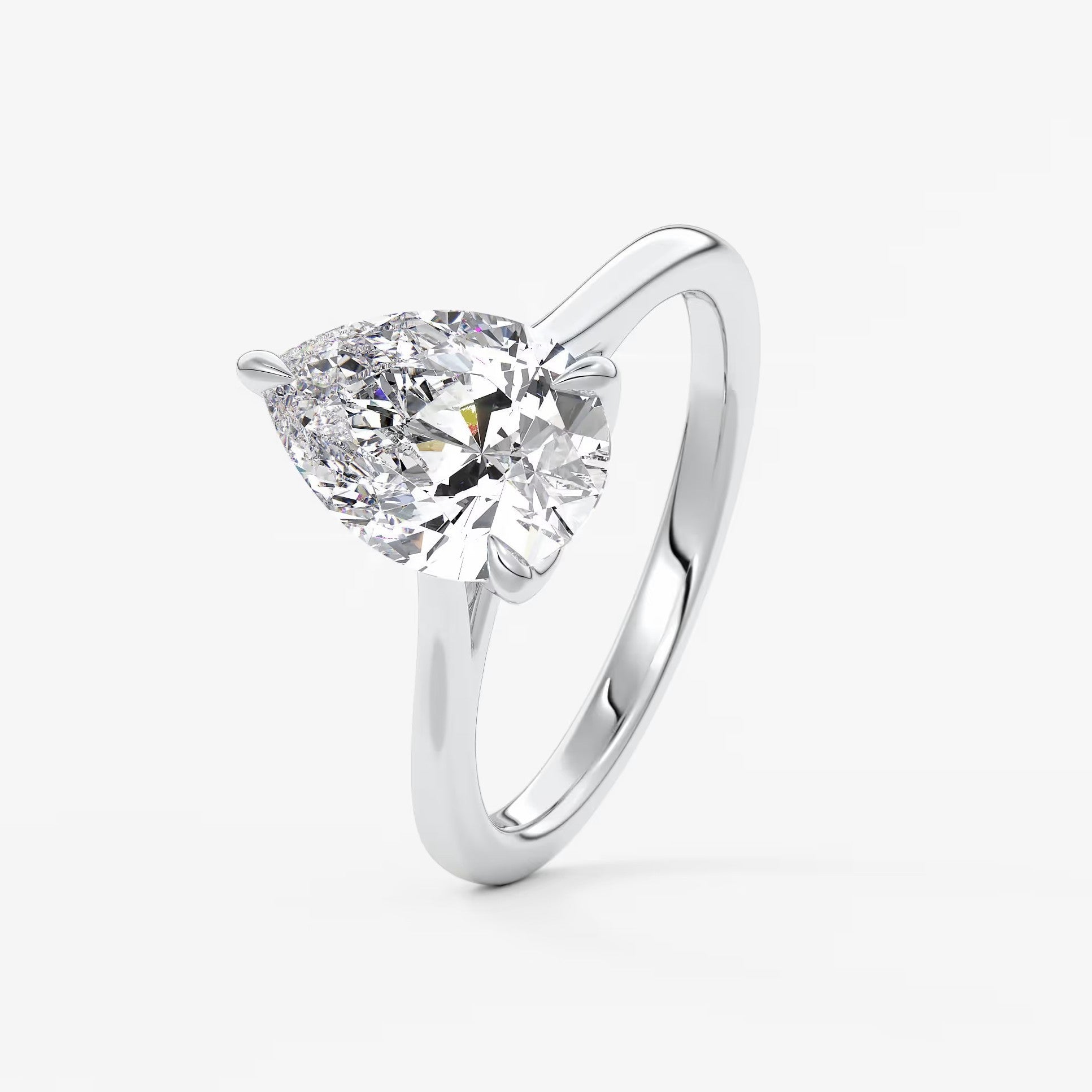 Tulip pear cathedral engagement ring
