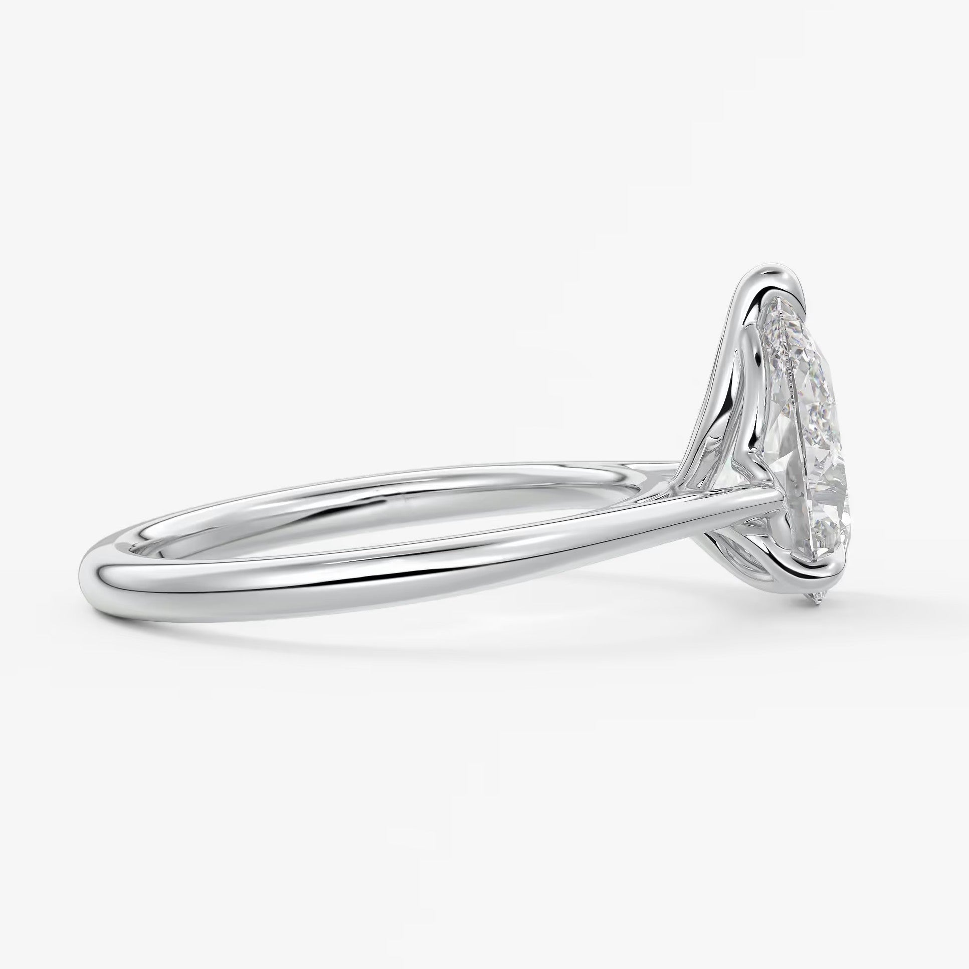Tulip pear cathedral engagement ring