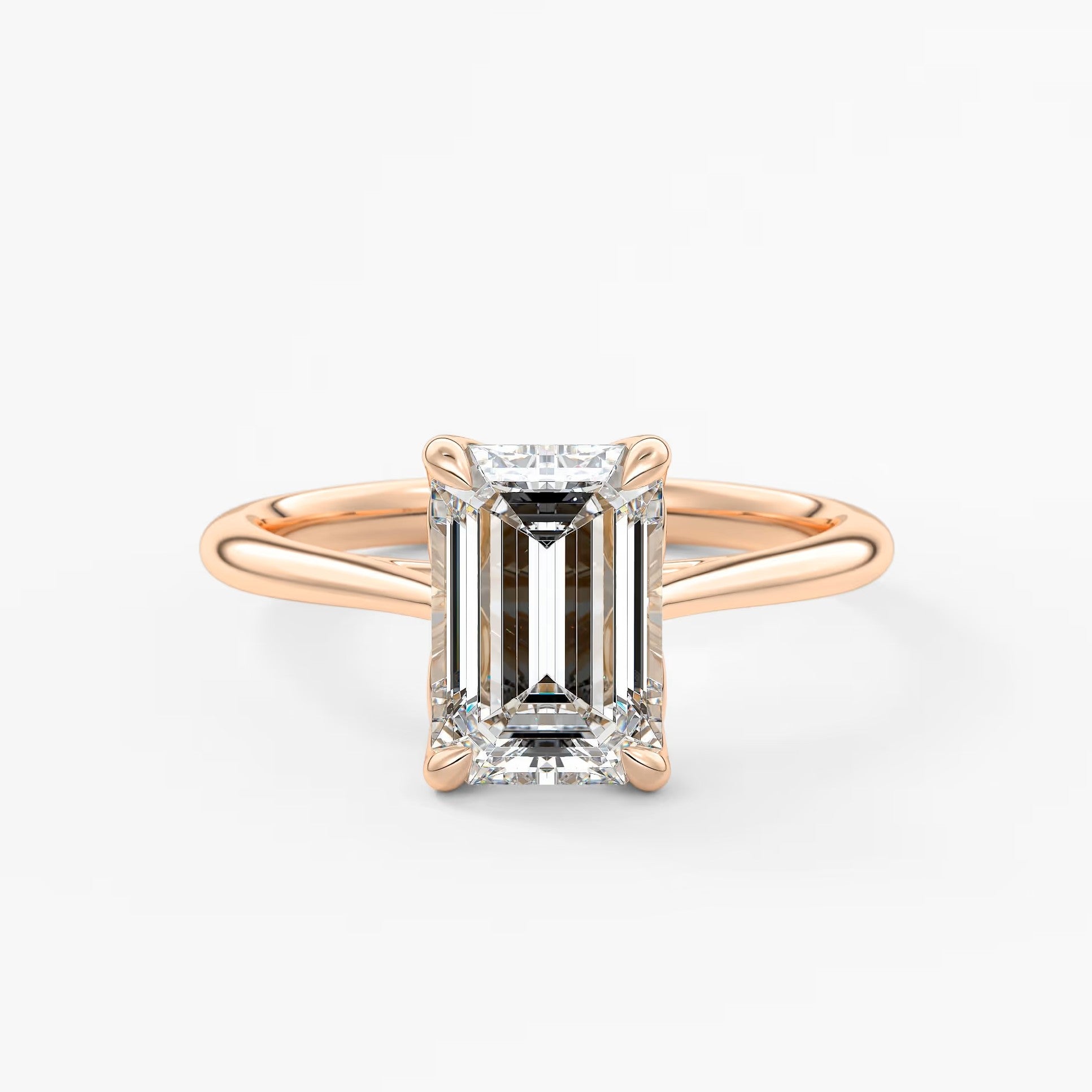 Tulip emerald cathedral engagement ring