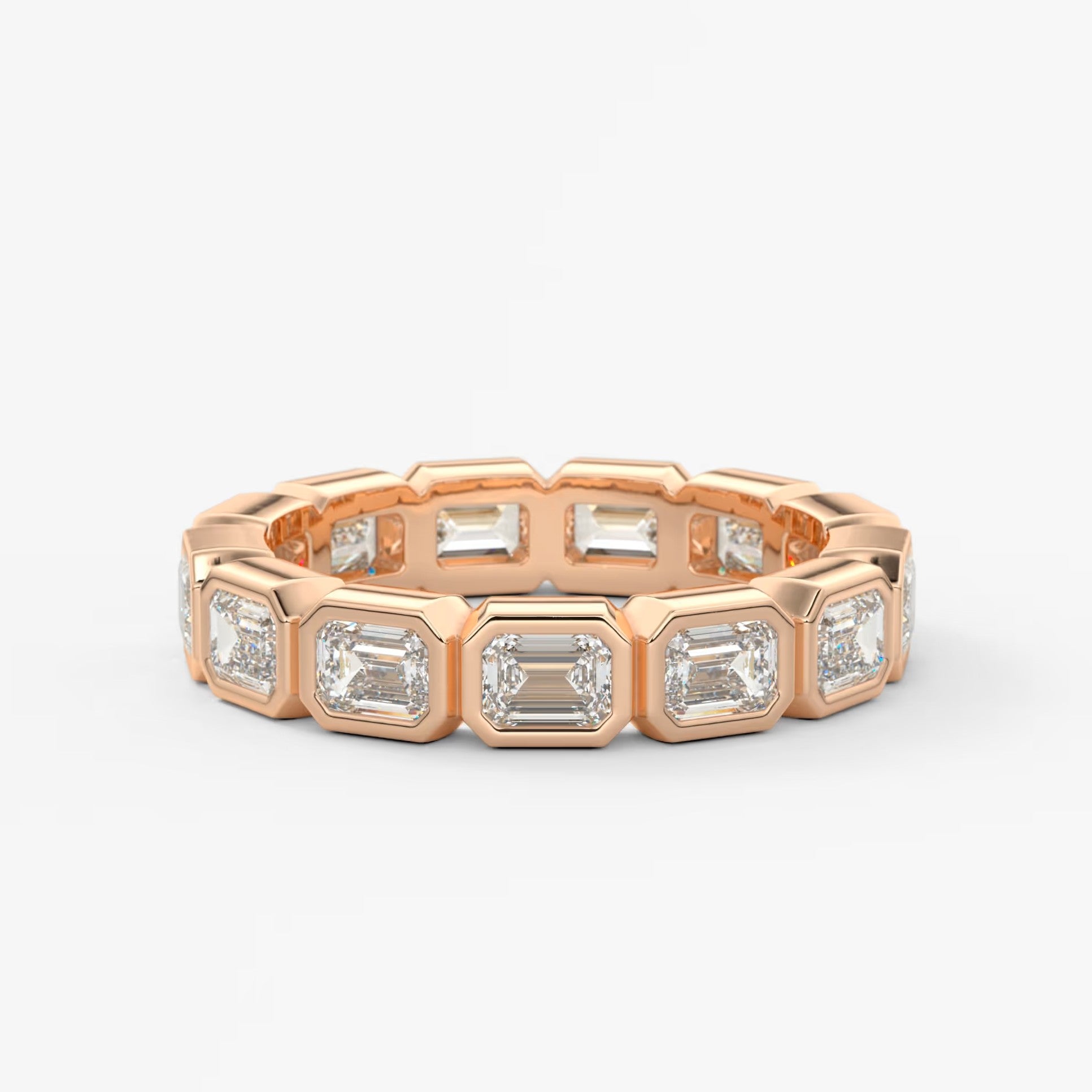 Valora east-west emerald bezel eternity band