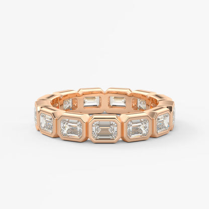 Valora east-west emerald bezel eternity band