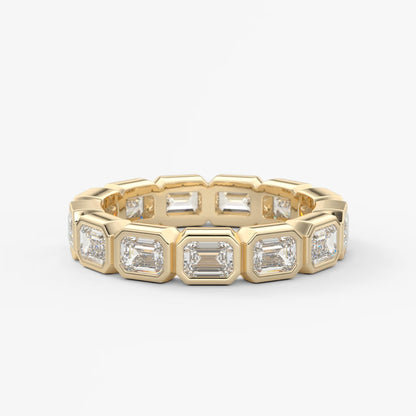Valora east-west emerald bezel eternity band