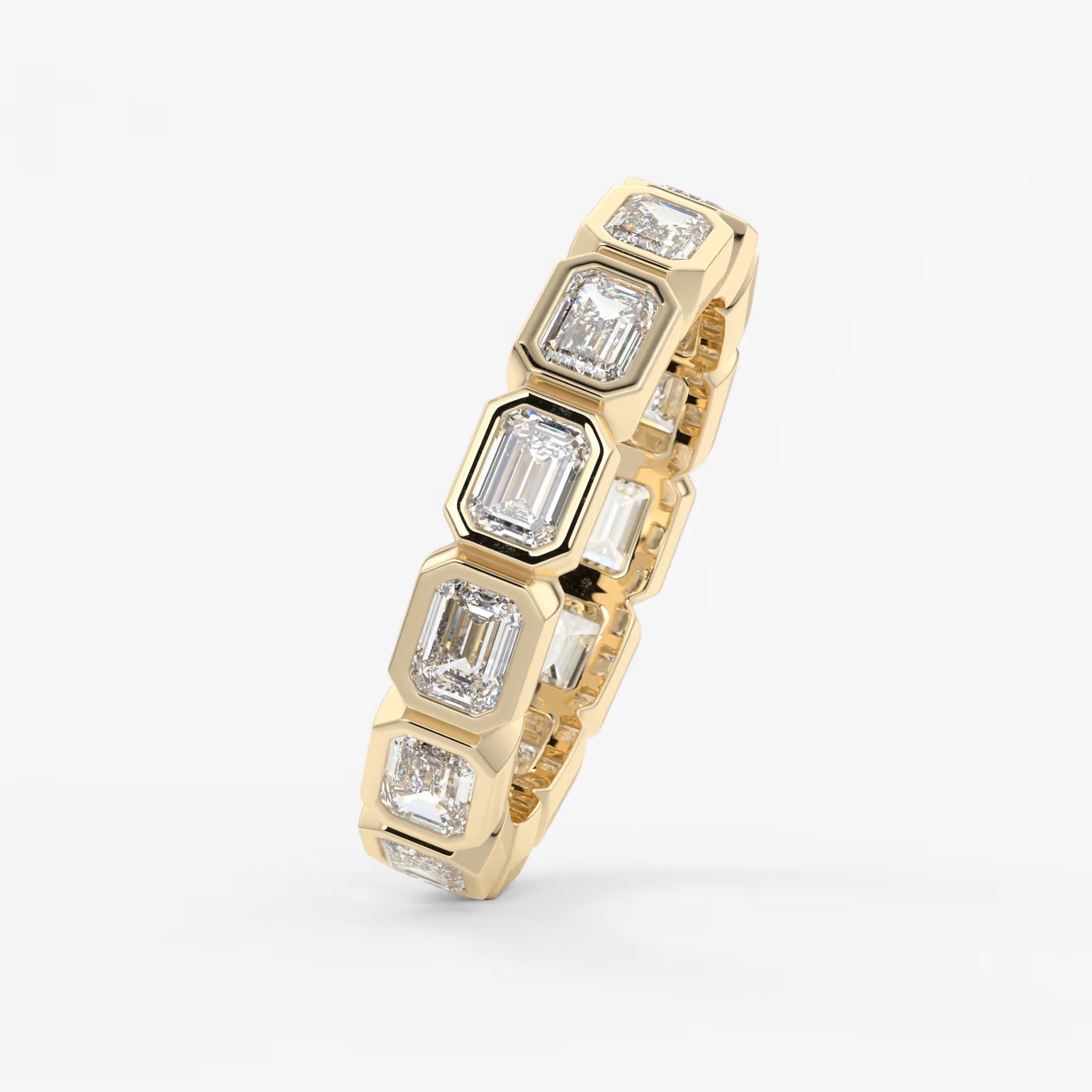 Valora east-west emerald bezel eternity band