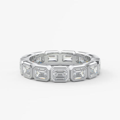 Valora east-west emerald bezel eternity band