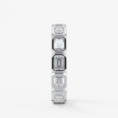 Valora east-west emerald bezel eternity band