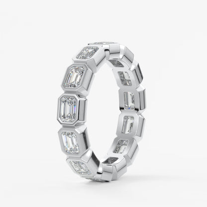 Valora east-west emerald bezel eternity band