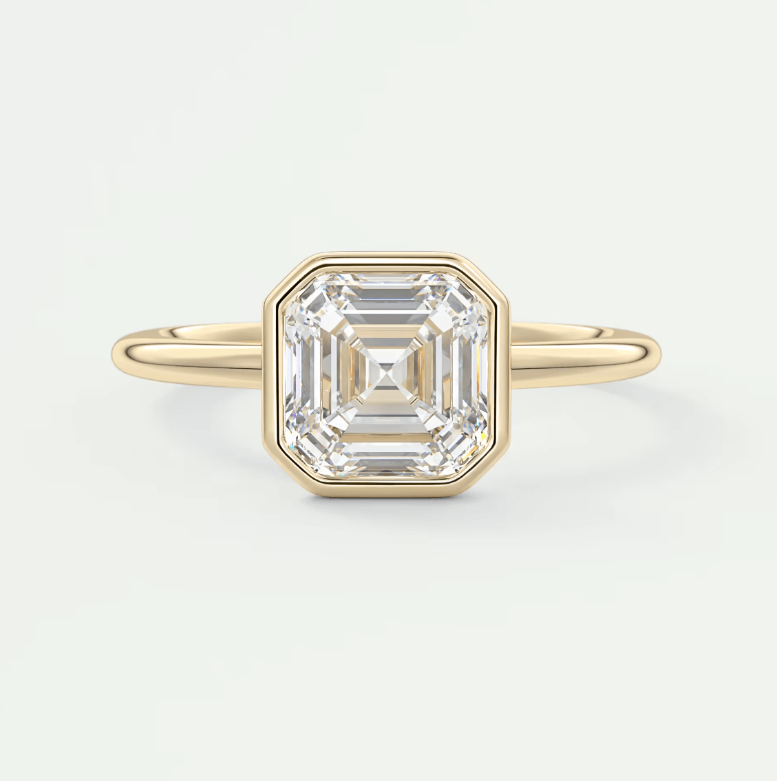 18k yellow gold asscher cut diamond engagement ring.