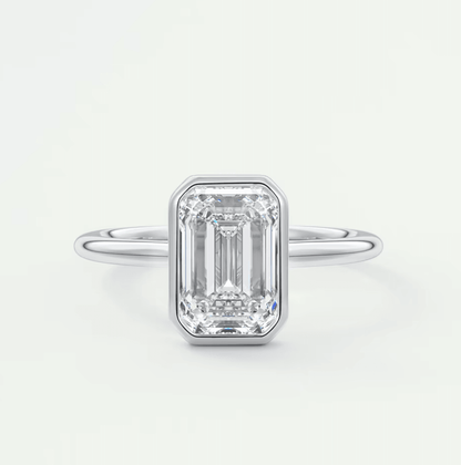 18k white gold emerald cut diamond engagement ring.