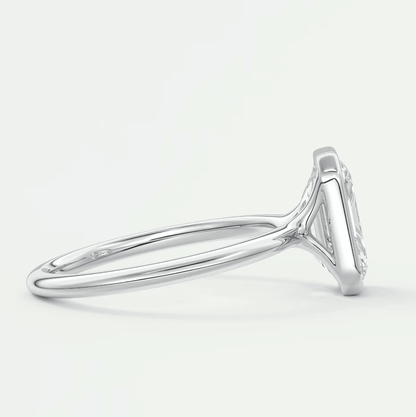 White diamond engagement ring with a classic solitaire design and prong setting.