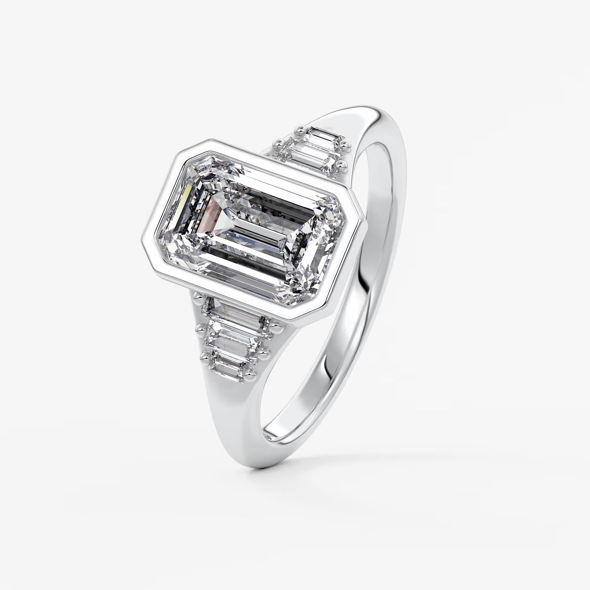 Véda emerald heirloom – seven-stone graduated baguette ring
