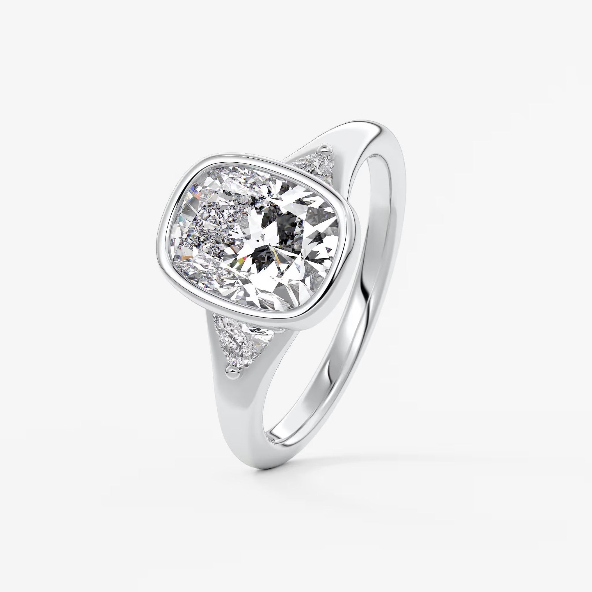 Véda trilogy – cushion with trillion side stone split shank engagement ring