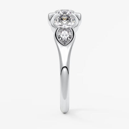 Virelle round and pear half-bezel engagement ring