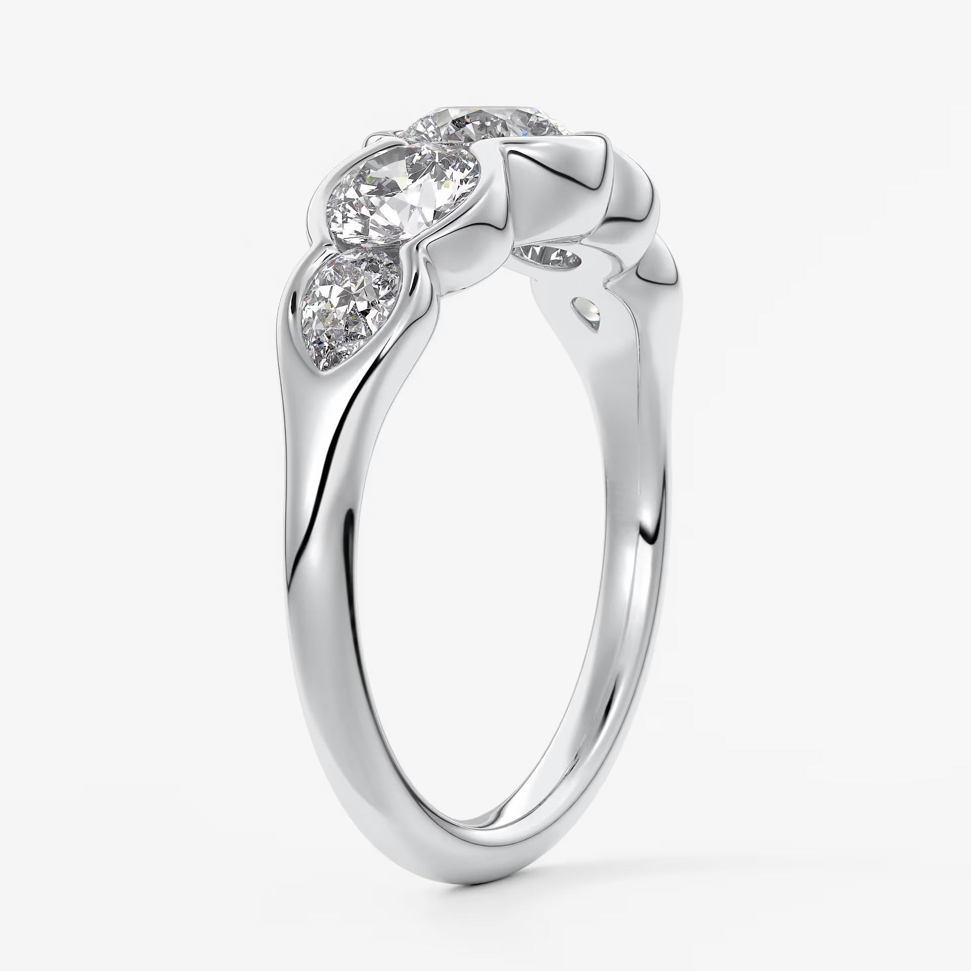 Virelle round and pear half-bezel engagement ring