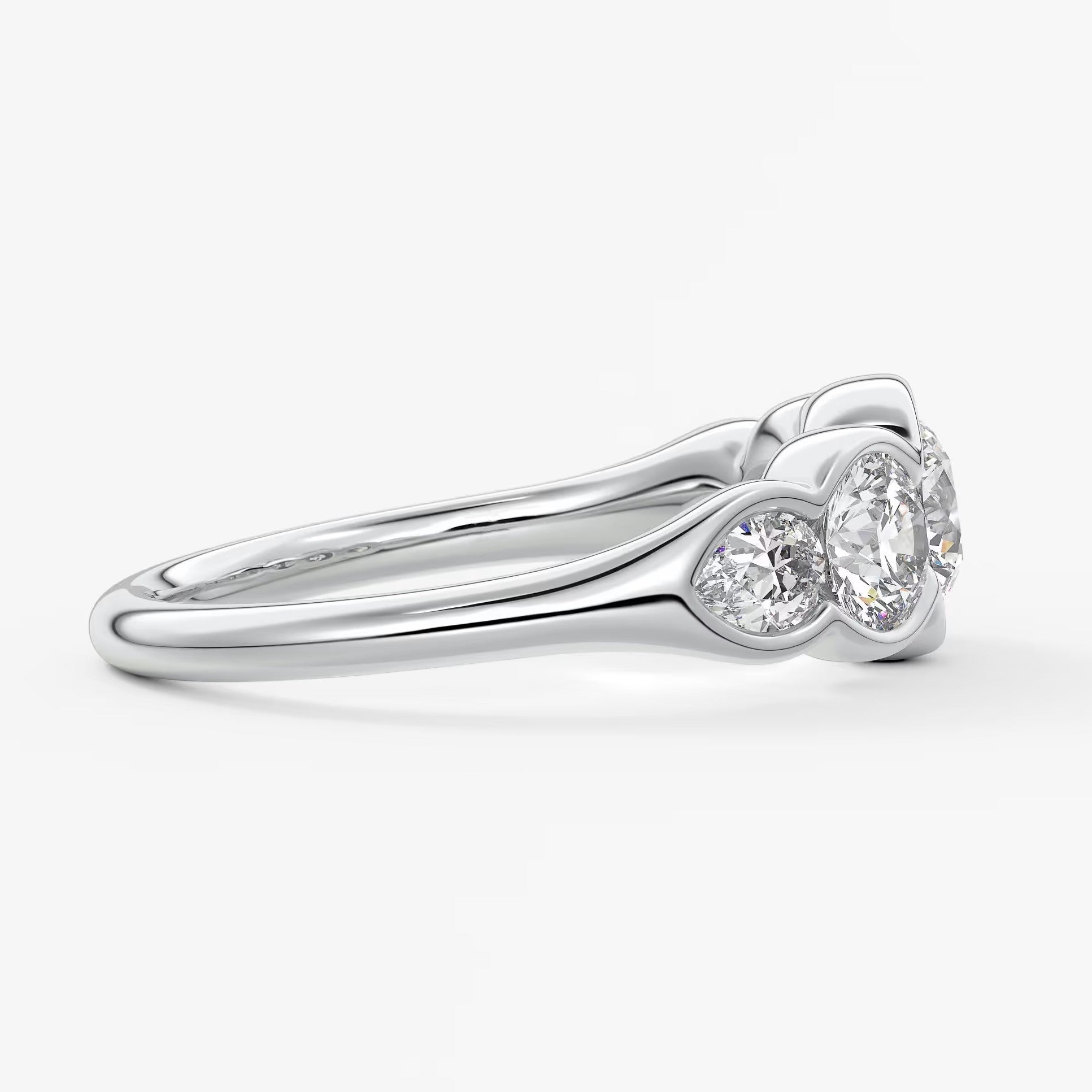 Virelle round and pear half-bezel engagement ring