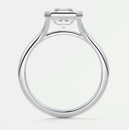 18-karat white gold engagement ring with a princess-cut diamond.