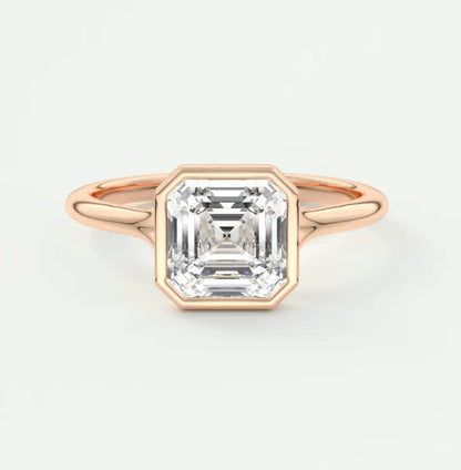 18k rose gold engagement ring with an asscher-cut diamond.
