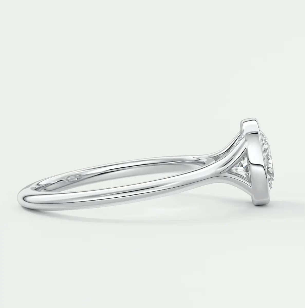 18k white gold diamond engagement ring with a halo design.